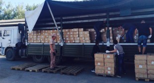 E.Ukraine’s Lugansk to start distributing Russian aid Monday, trucks return home
