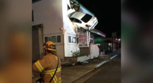 Speeding car takes flight, plows into 2nd floor of office building (PHOTOS)